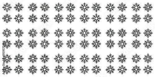 Arrangement of intricate detailed black snowflake patterns on a white background