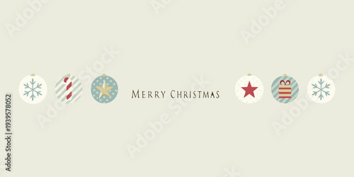Festive christmas ornaments and a merry christmas greeting banner