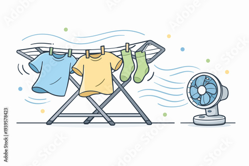 Clothes drying on rack with electric fan blowing wind to speed up process