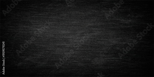 A dark and vintage black canvas background features a rough grunge texture with a blank, weathered surface and an old paper pattern, creating a dirty grey backdrop for industrial design