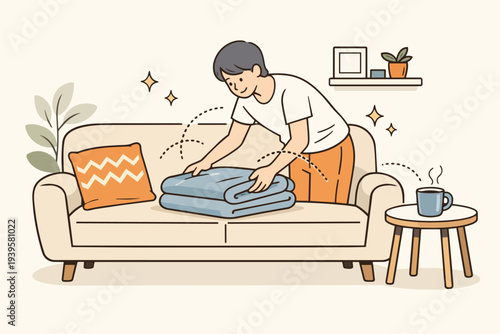 Person folding blanket in living room, tidying up home for organization