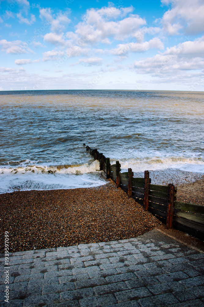 Fototapeta premium Waves crashing on the groynes