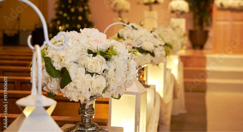 Elegant white floral arrangements on aisle seats in church