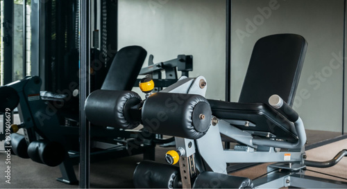 Modern leg press machine in professional gym setting