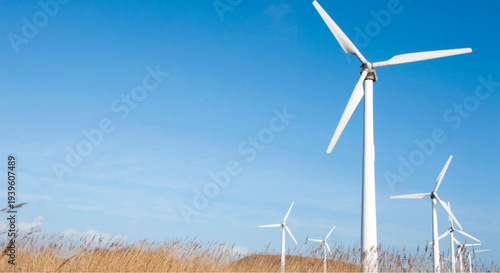Wind turbines generating clean energy in a serene landscape