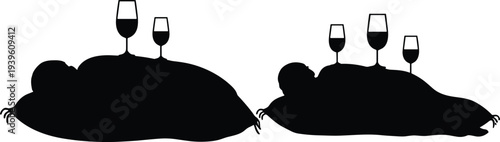 Silhouettes of couples enjoying wine together romantically