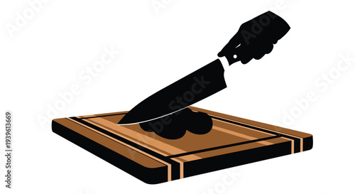 Silhouette of a hand using a sharp chef knife to slice food on a wooden cutting board in a professional kitchen setting.