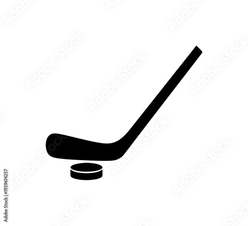 Black hockey stick and puck vector icon