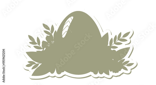 Easter egg nestled in a bed of leaves and foliage.