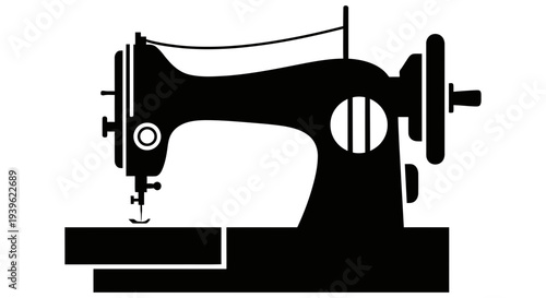 classic black silhouette of a vintage sewing machine on a white background representing traditional craftsmanship and textile industry