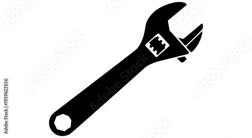 Adjustable wrench with open jaws and long handle displayed against a white background symbolizing tool utility and versatility in various tasks and projects