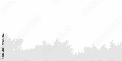 Silhouetted forest landscape against a pale almost white background