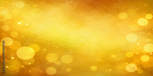 An abstract golden bokeh background features a bright and shiny festive texture filled with glowing light particles and a defocused holiday glitter pattern