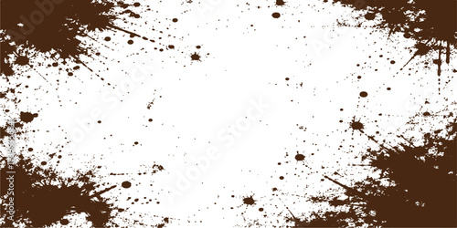 Abstract grunge background featuring a dark ink splatter texture with liquid paint drops and artistic powder patterns on a dirty paper design