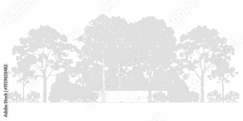 Silhouetted trees and a building facade with a water feature