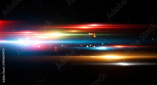 Multi-colored Light Streaks and Bokeh Particles with Film Grain on a Dark Background stock upscaled