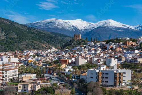 Quadro em tela Village of Velez de Benaudalla in Granada with the Sierra Nevada mountains in the background