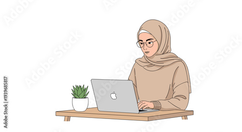 A focused Muslim woman in a beige hijab and glasses sits at a wooden table, typing on a silver laptop with a succulent beside her.