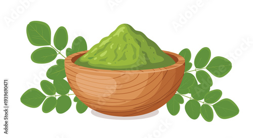 A rustic wooden bowl filled with a mound of vibrant green moringa powder is surrounded by green moringa leaves against a clean white background.