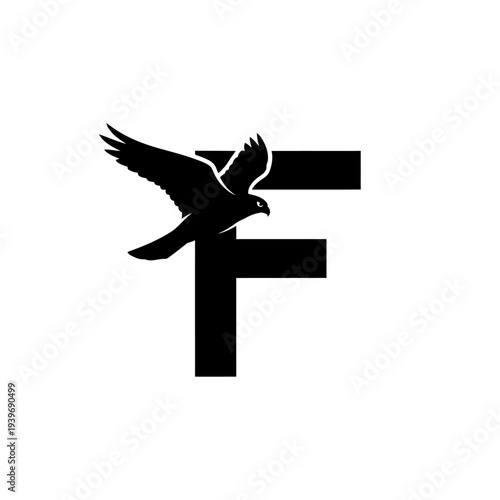 Black silhouette of a falcon soaring in flight within the letter f graphic