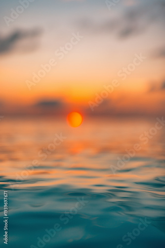 Radiant tranquil sunset ocean closeup with colorful reflections calm water surface serene relaxing seascape nature background. Serene waves ripples peaceful sunlight