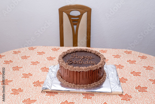 Waiting for the Birthday – Empty Chair and Chocolate Cake.