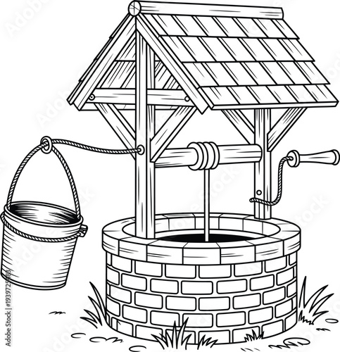Old fashioned stone water well with wooden roof and bucket for drawing water