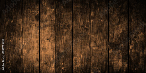 Weathered brown timber planks form a rustic old wood texture with a rough grunge pattern, perfect for a natural hardwood floor or vintage wooden wall backdrop