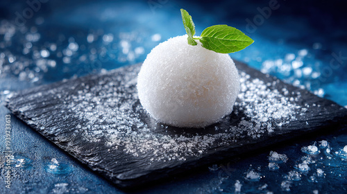 Sugar Mochi with Mint Leaf on Slate Surface