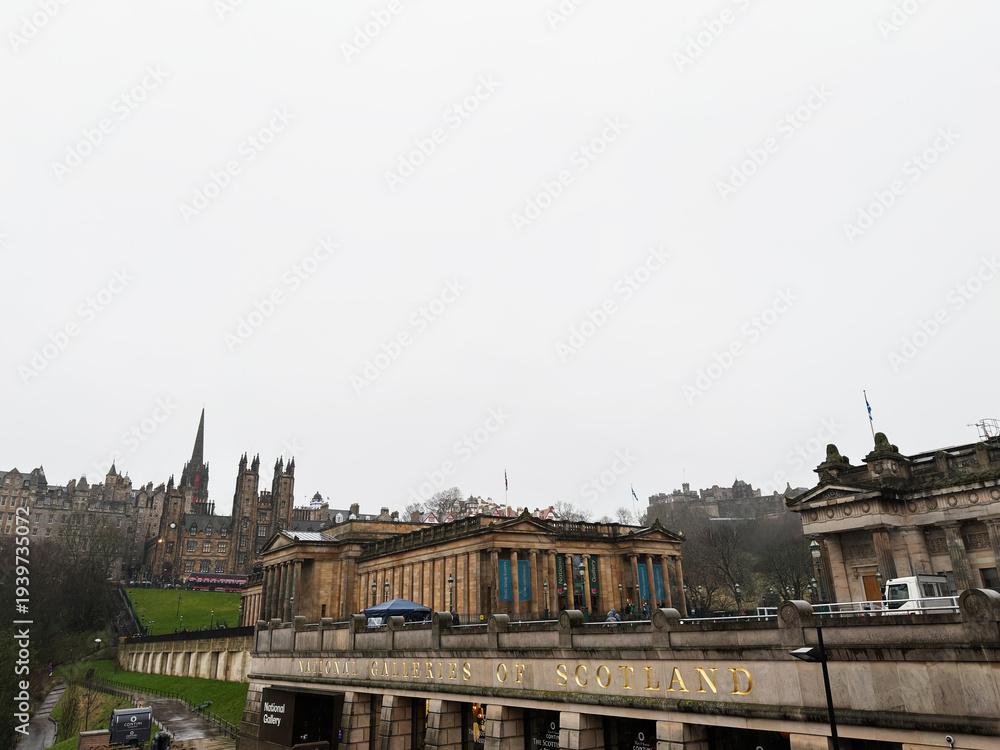Fototapeta premium National Galleries of Scotland building and Edinburgh cityscape with historic castle skyline and neoclassical museum architecture in Scotland UK