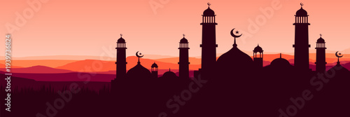 Panoramic sunset Ramadan Kareem background with mosque silhouette and mountain landscape