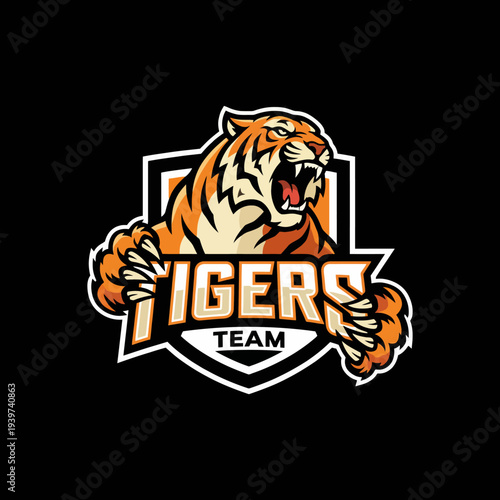 An aggressive tiger logo, symbolizing power and strength, bursting through a shield, perfect for sports teams looking to convey determination and fierce competitiveness.