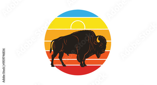 Bison walking in sunset silhouette.