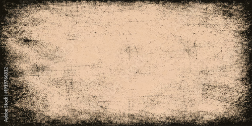 Vintage brown grunge paper texture with an ancient parchment pattern and aged rough surface provides a blank antique backdrop design for abstract grungy art