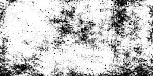 Vintage black ink splash on a dirty textured paper wall creates a dark grunge pattern design with an old paint splatter element and a dusty vector border frame