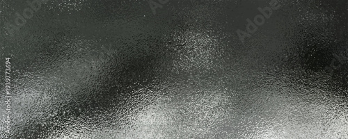 Shiny silver leaf foil texture background with a smooth and highly reflective surface — perfect for luxury design, decorative elements, and premium branding.