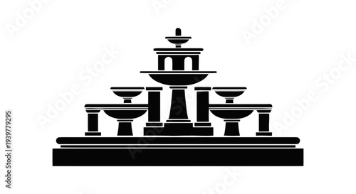 Vector illustration of black silhouette of a tiered water fountain icon on a transparent background