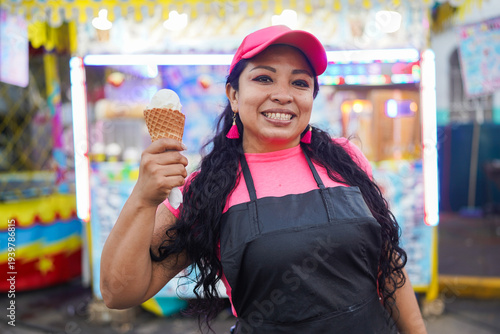 Cuadro en lienzo Latin woman entrepreneur smiling selling ice cream at fair