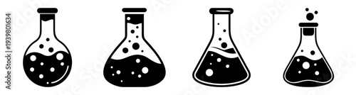 Set of four laboratory glass flasks with bubbling liquid and cork stoppers for science education and research