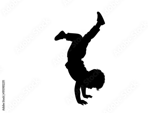 Active Child Doing Handstand Gymnastics Silhouette
