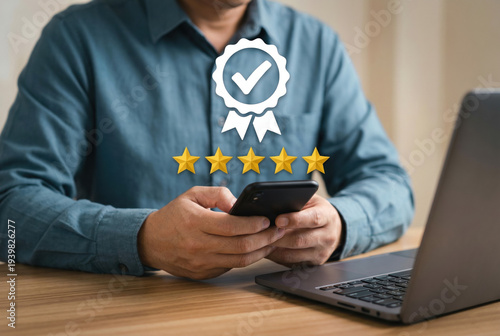 Wallpaper Mural Man Giving Five Star Customer Service Review via Smartphone and Laptop Torontodigital.ca