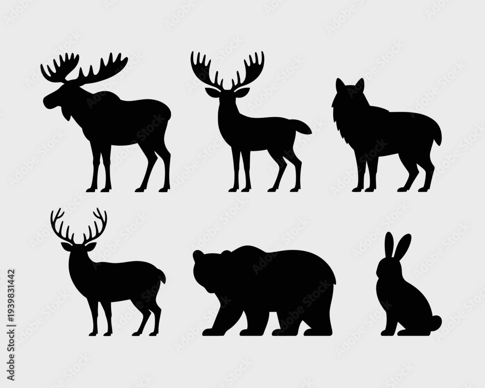 Fototapeta premium Silhouettes of various wild animals including deer, moose, wolf, bear, and rabbit.