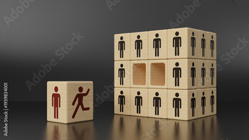 A wooden block with a running stick figure departing from a larger stack of blocks, symbolizing employee turnover and personnel changes.