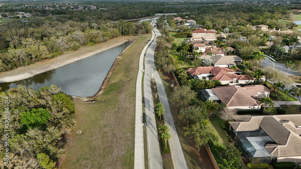 Fototapeta premium aerial of HIdden River Trail street, park-like cut through from Lorraine Road to Lakewood Ranch Boulevard, Bradenton, Florida