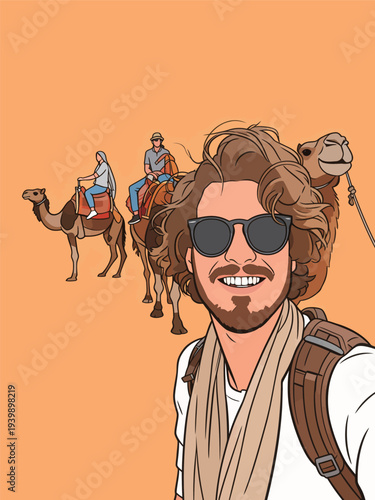 A man smiles for a selfie while camels and riders are seen in the background under a clear sky in the desert.