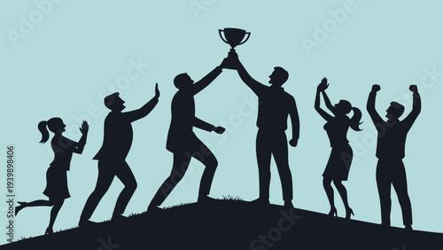 Diverse team celebrating victory with trophy on hilltop