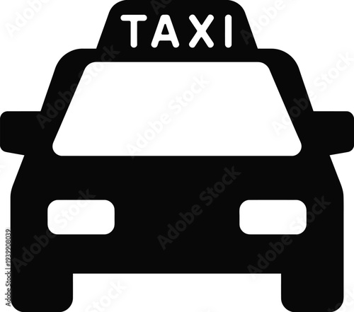 Black and white taxi with sign on vehicle