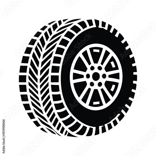 Black and white tire with tread pattern and wheel hub