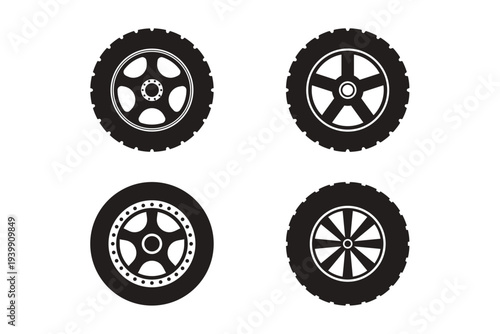 Four black and white tire with different patterns wheel