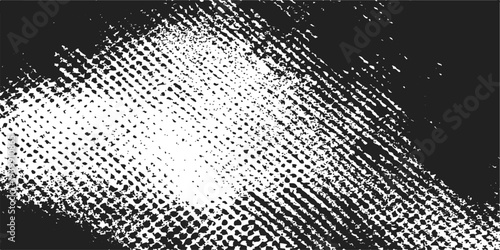 Abstract a monochromatic representation, a textured surface of woven material. The contrast between light and dark creates an intriguing play of depth and form.